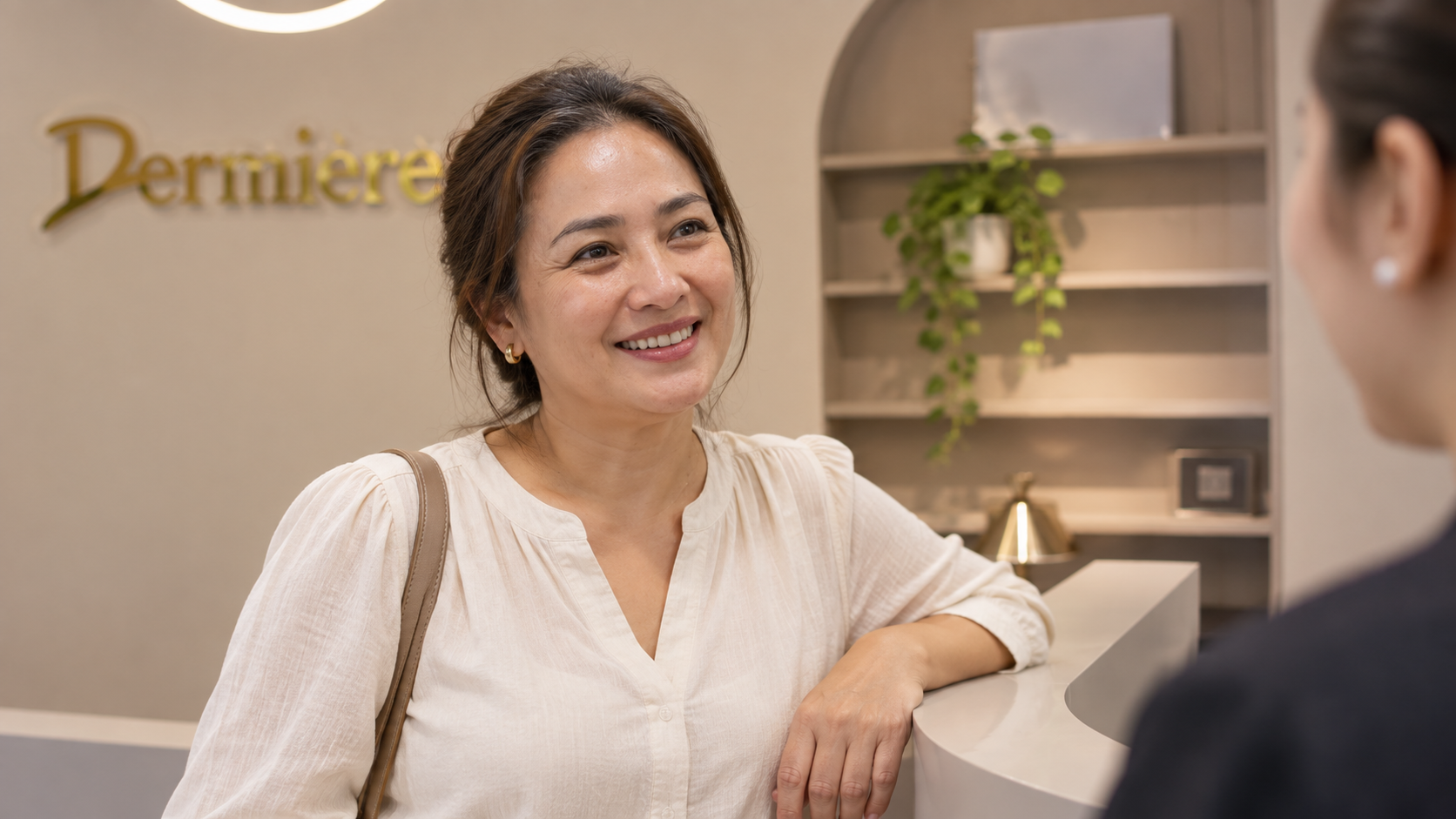 Mature Filipina client in a Dermière clinic consultation